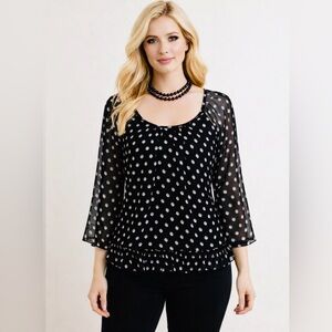 Vero Moda polka dot blouse soft ruffles around the hemline , in great condition